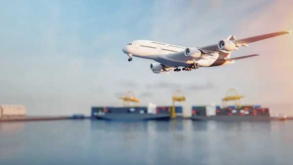 Cargo airplane flying over container ships at an international shipping port.
